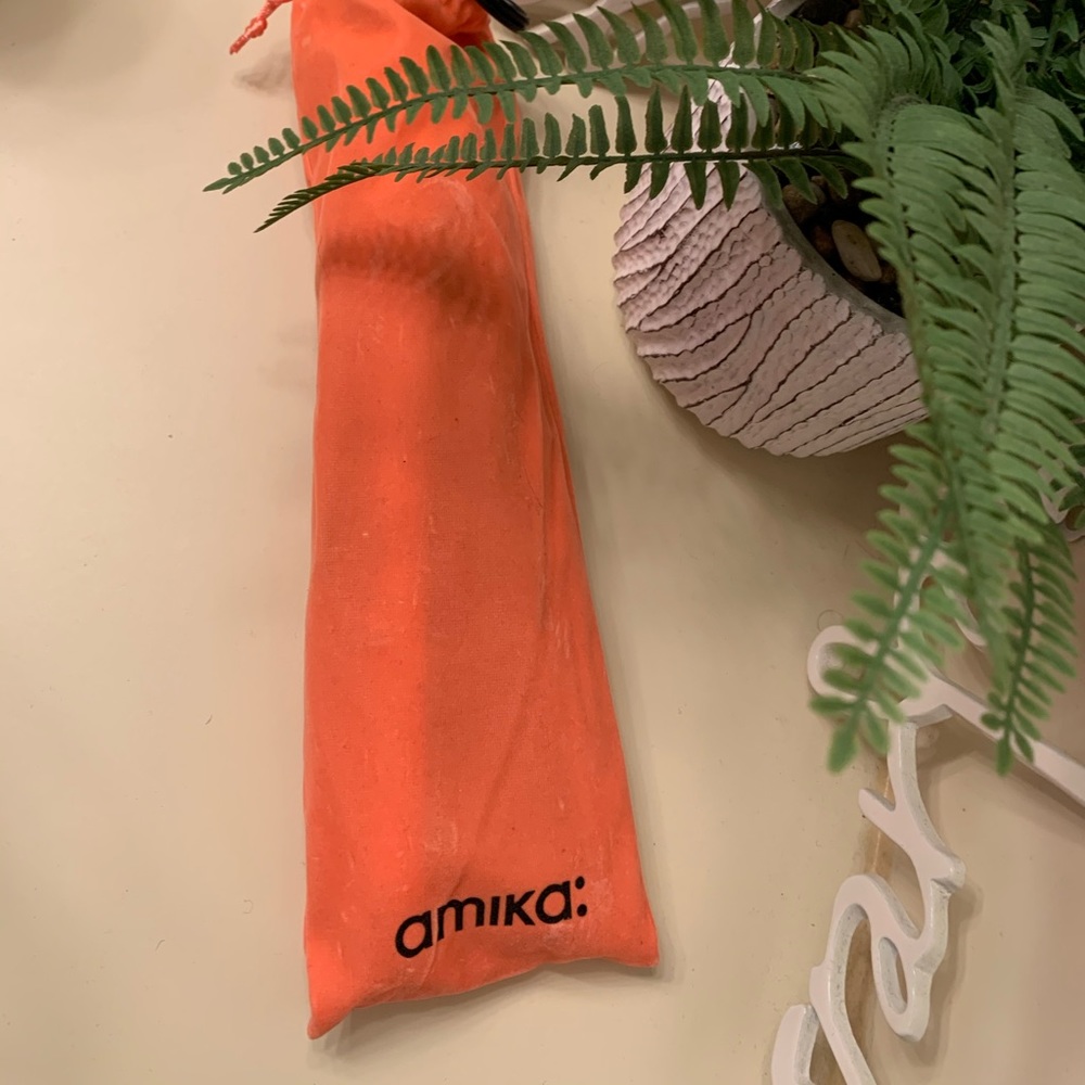 Amika Straightener. Never been used !